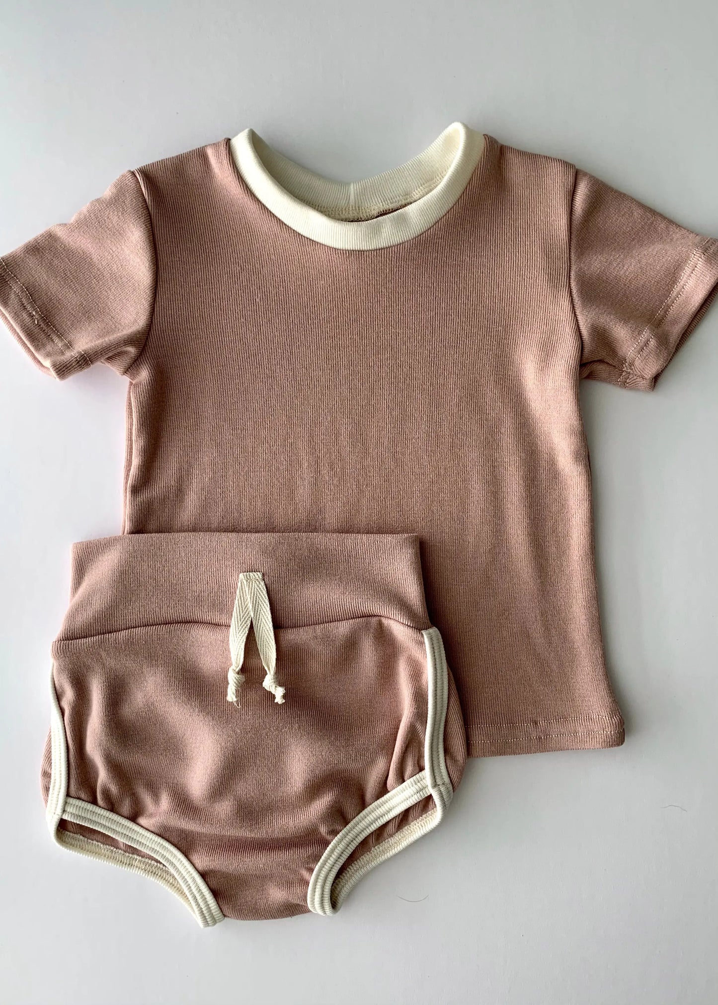 The Tiny Details Blush High Rise Track Shorties