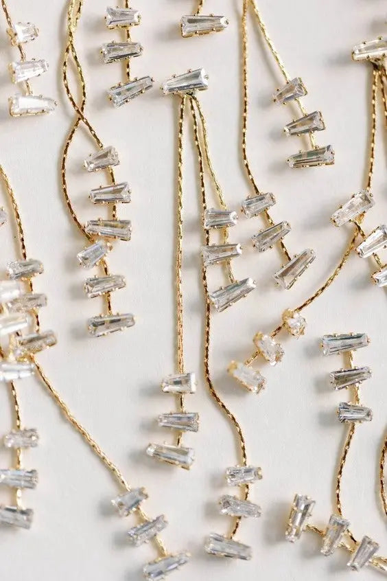 The Tiny Details Cascading Diamond Tassel Statement Earrings