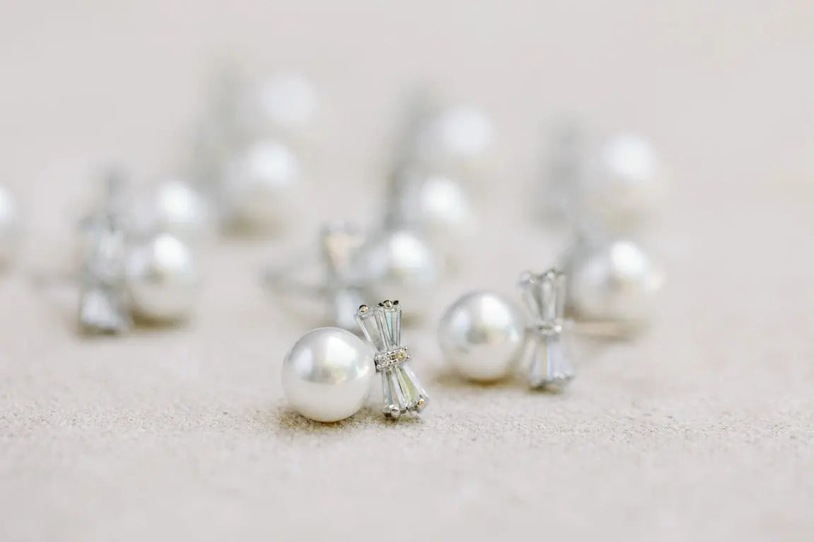 The Tiny Details Diamond Bow Mini Pearl Studs
