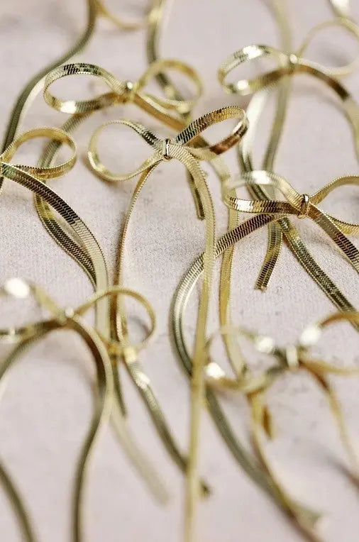 The Tiny Details Maxi Gold Duster Bow Earrings