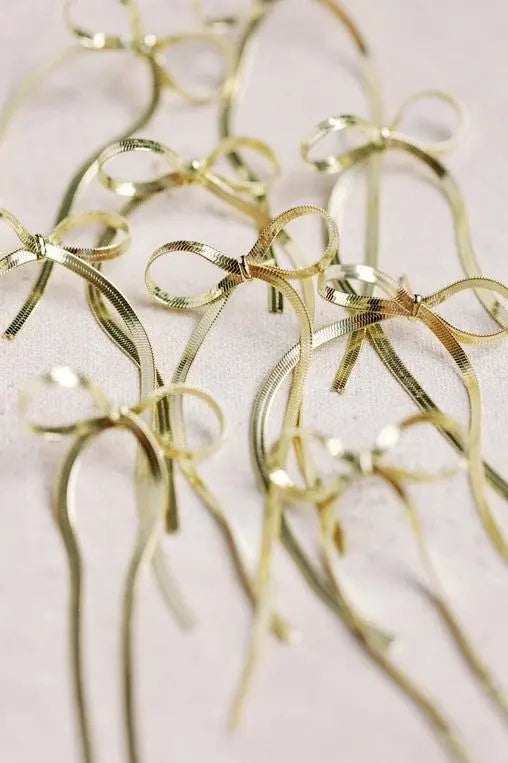The Tiny Details Maxi Gold Duster Bow Earrings