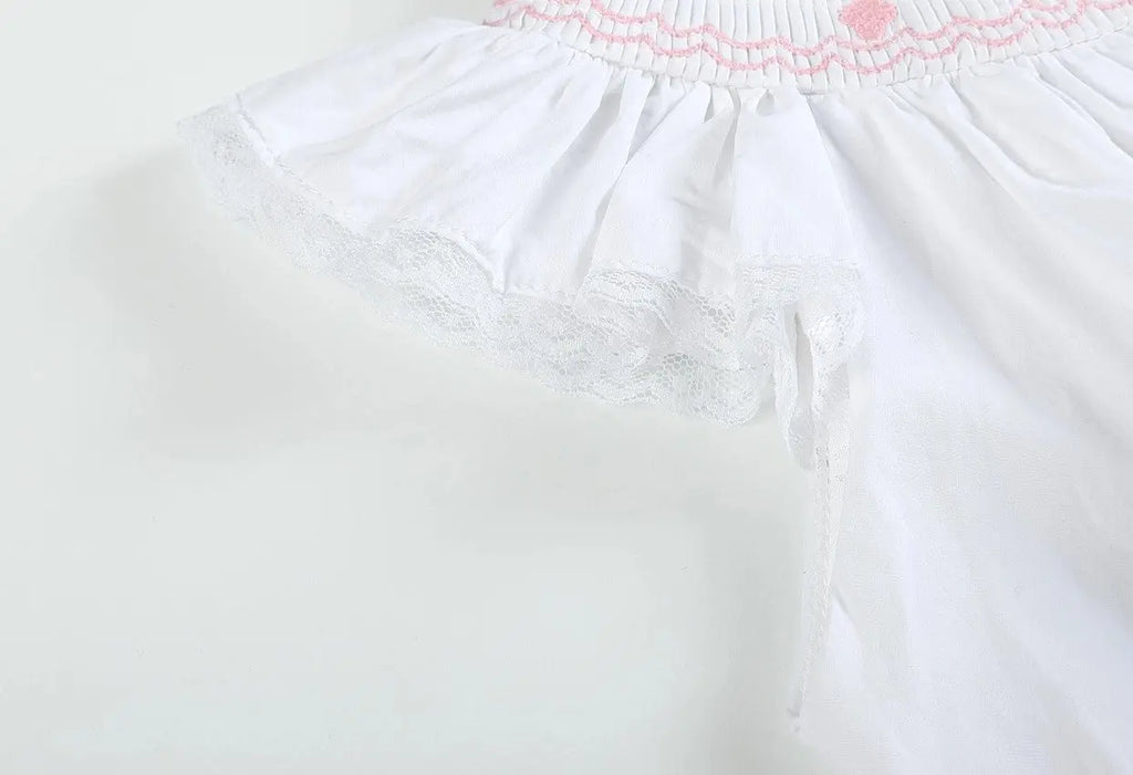 The Tiny Details Pink Cross Smocked Bishop Dress