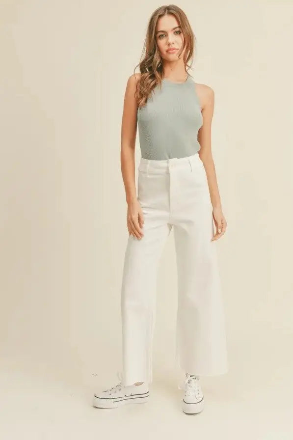 A woman modeling a seafoam classic ribbed tank top