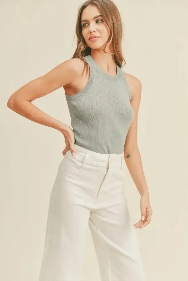A woman modeling a seafoam classic ribbed tank top