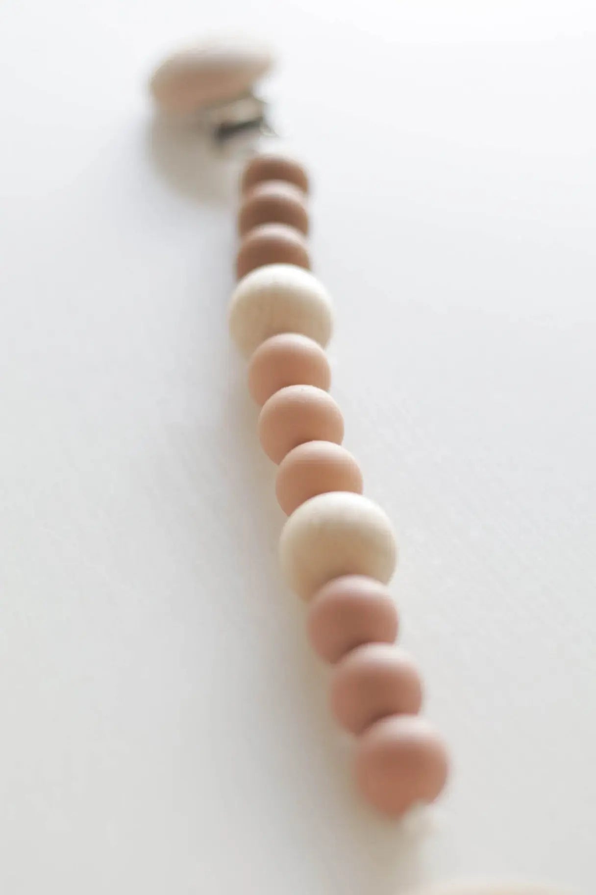 The Tiny Details Pacifier Clip in Sun
