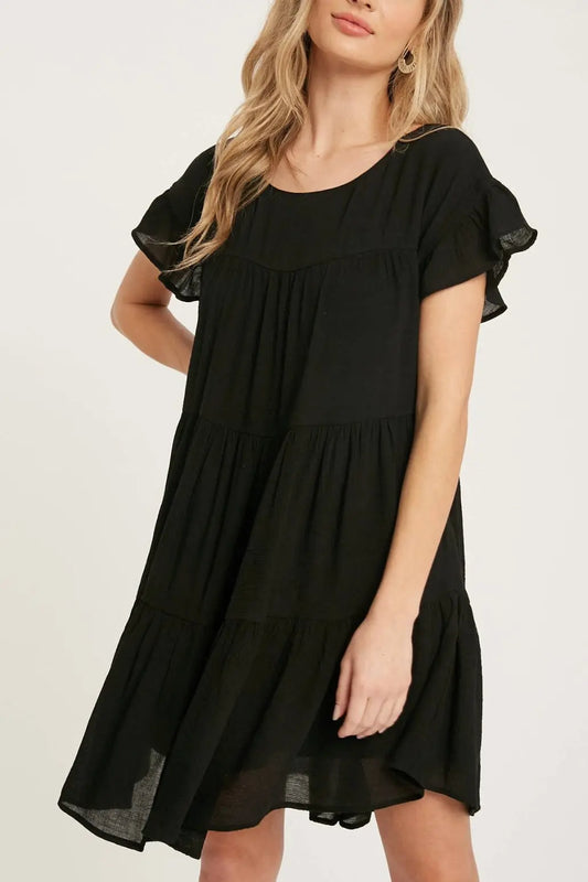 The Tiny Details Ruffle Hem Tiered Black Baby-Doll Dress