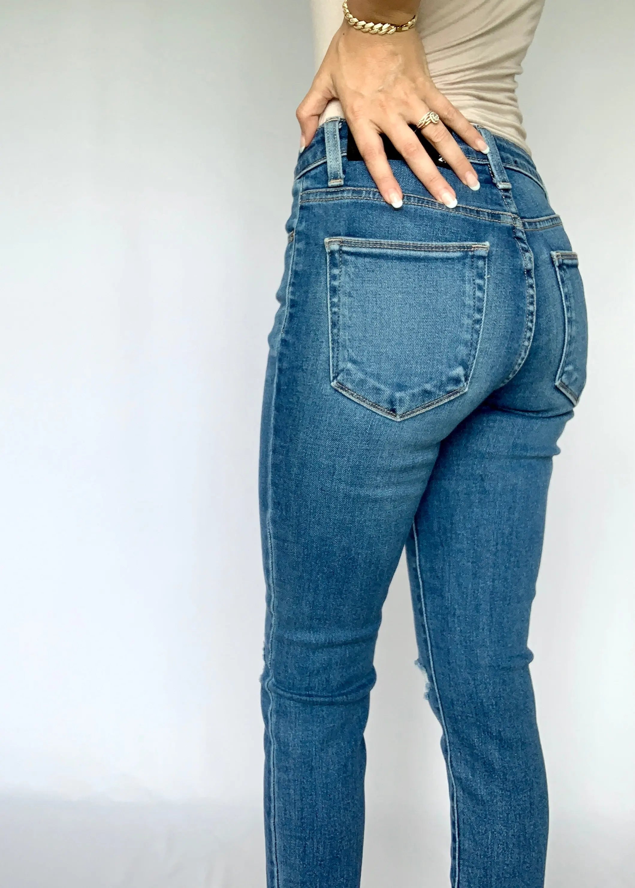 The Tiny Details Skinny Medium Wash High Rise Distressed Denim