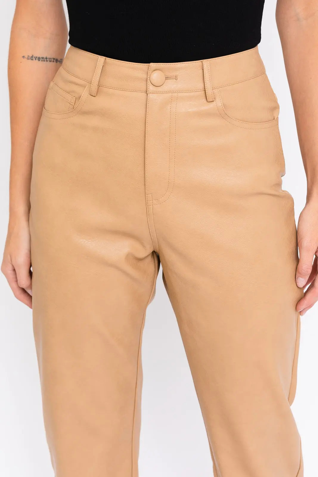 The Tiny Details showcasing Tan Faux Leather Straight Leg Pants for women